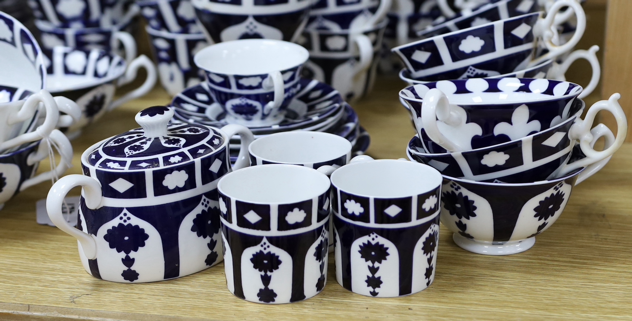 Unfinished Royal Crown Derby bone china dinner service and tea ware, comprising teapots, cups, saucers, dinner plates, side plates, coffee cans, etc.